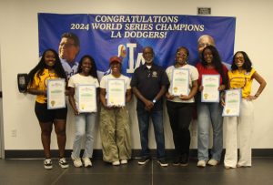 board members with certificates